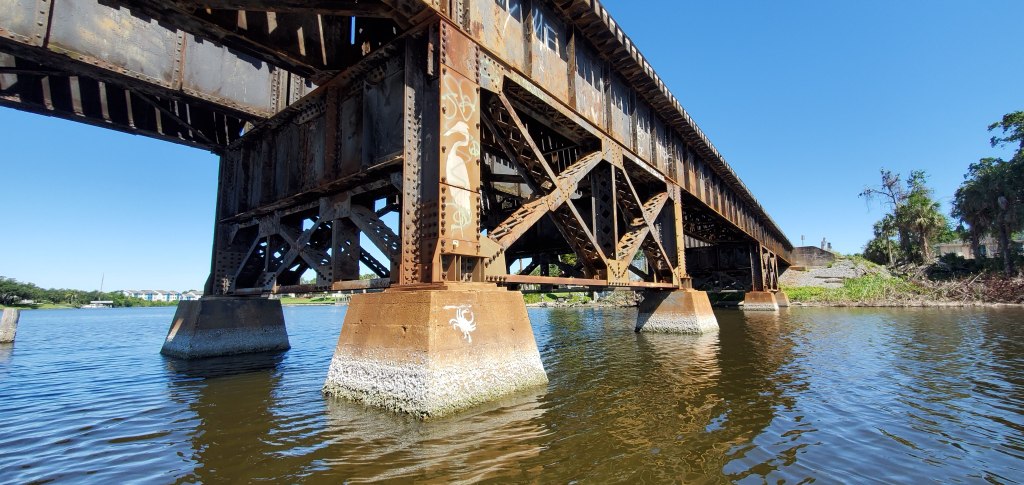 Kayaking up the Eau Gallie River and under the train tracks in Melbourne Florida