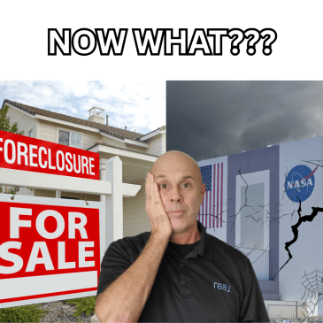 foreclosure in the background and a dark cloud behind the VAB building