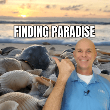 beach photo at sunrise with shells above the waterline