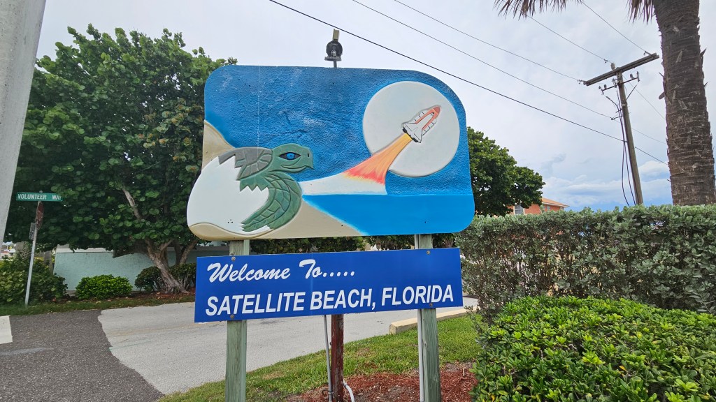 welcome to satellite beach sign