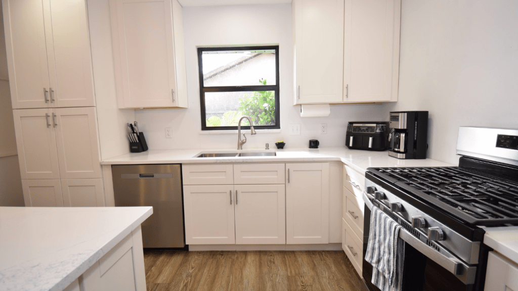 new updated kitchen with white shaker cabinets